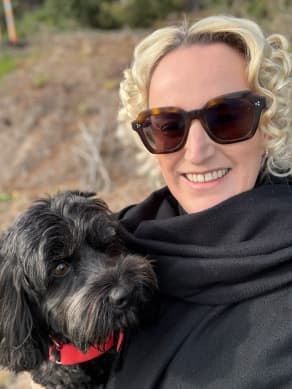 Glenys Talivai and her dog Coco.