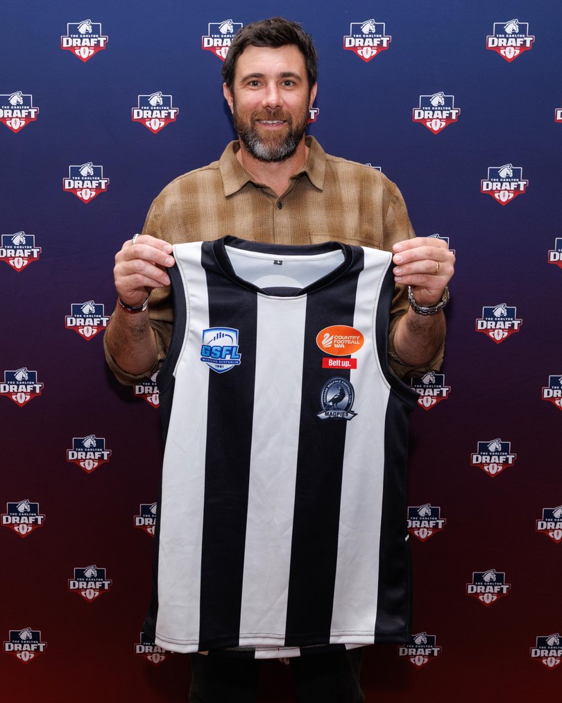 Josh Kennedy, the West Coast Eagles great, with a Magpies jumper.