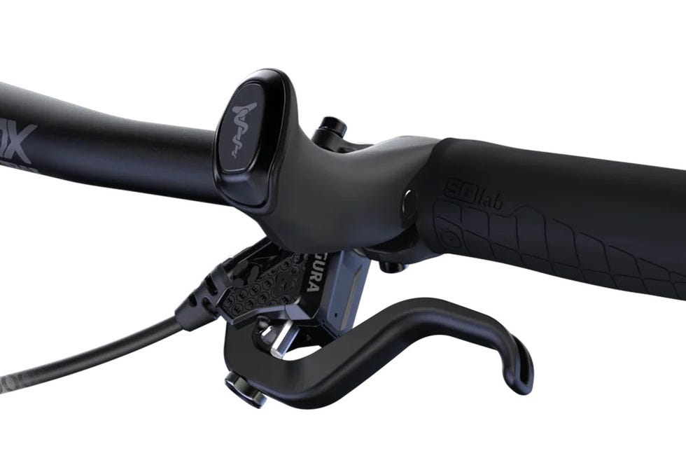 Close-up of a bicycle handlebar featuring grips and brake lever. Close-up of a bicycle handlebar featuring grips and brake lever.