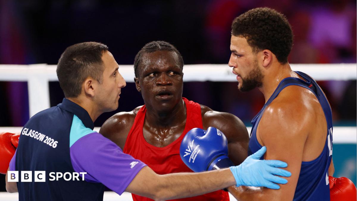 Aziz Abdul reacts after being disqualified for a headbutt during fight against England's Damar Thomas