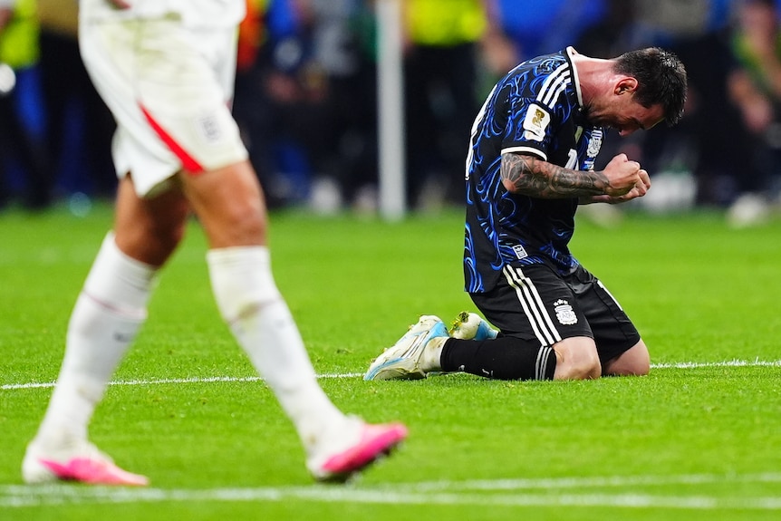 Lionel Messi drops to his knees in celebration
