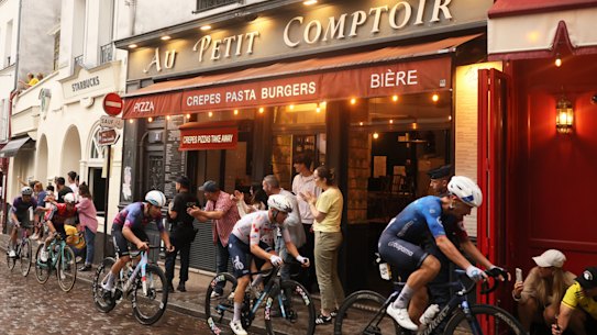 Hours before the peloton was due to arrive, spectators had already packed the Parisian neighbourhood.