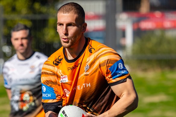 Adam Doueihi returned to Wests Tigers training on Tuesday.