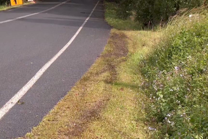 a skid mark on the road after a man was involved in a police pursuit