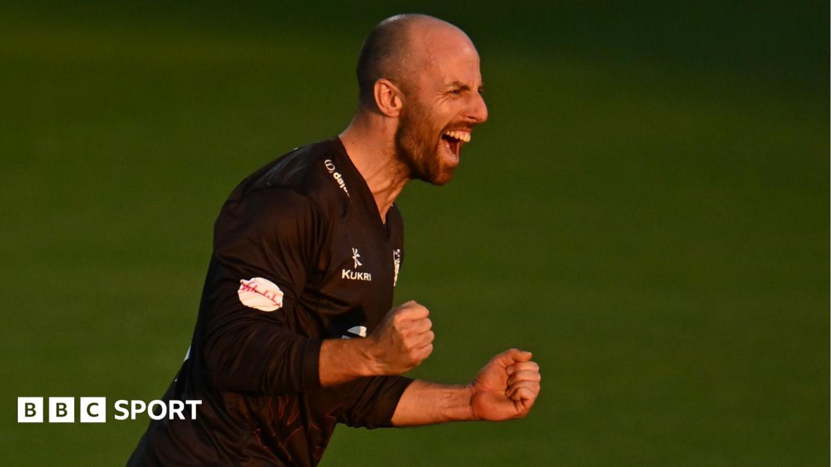 Jack Leach, wearing Somerset's black T20 shirt, celebrates taking a wicket against Worcestershire