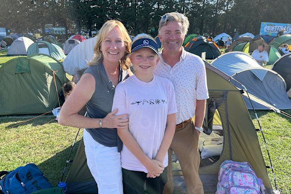 Courtney, Kevin and Addison Cadwell in “The Queue” at Wimbledon. 