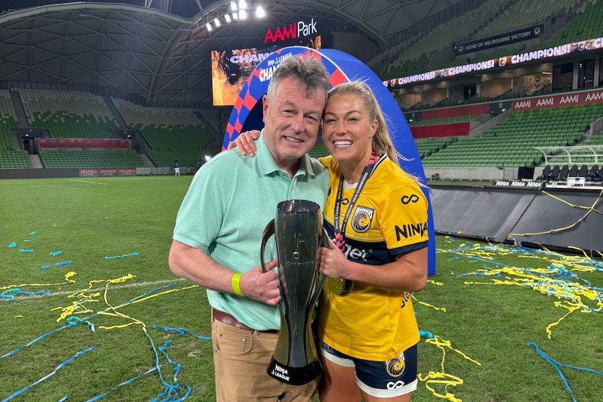 Sarah Rowe with her dad Alan after winning the A-League Women championship.