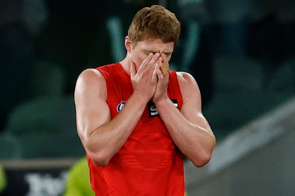 The pain of it all: Gold Coast’s Matt Rowell.