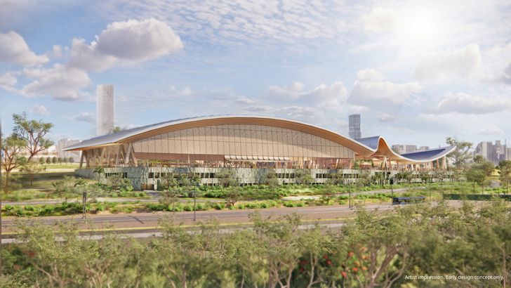 The aquatic centre design is sunken into the sloping landscape and tiered to preserve parkland, and covered with a “floating” roof that's designed to allow ventilation and natural light to enter the building.