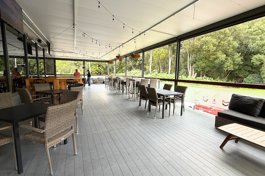 A sprawling deck with chairs and tables out the back of the Erina Leagues Club.