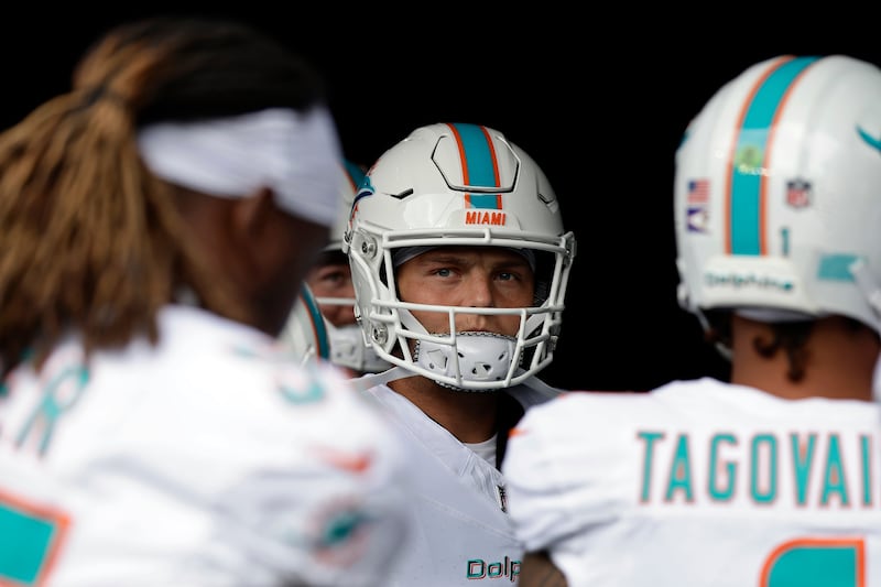 Miami Dolphins quarterback Zach Wilson (0) takes the field before a game against the New York Jets, Sunday, Dec. 7, 2025, in East Rutherford, N.J.