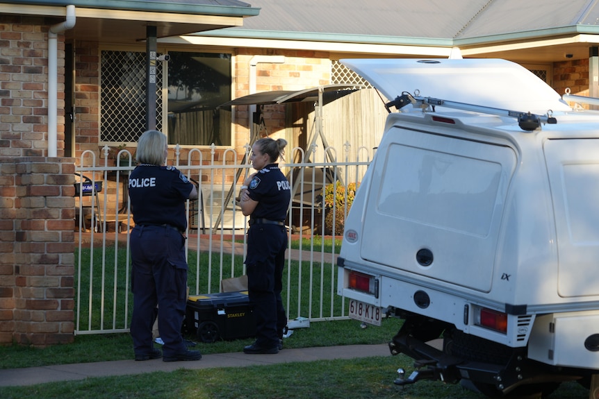 police stand outside home