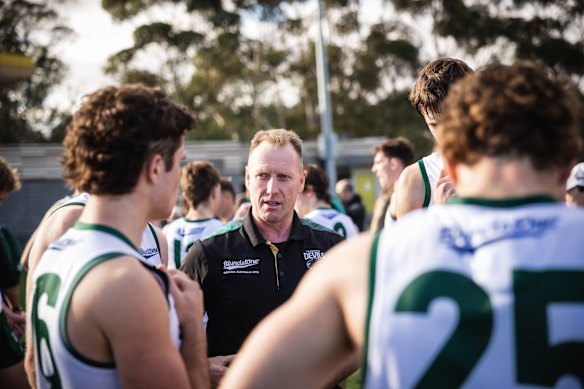 Knights in the Devils’ VFL huddle. 