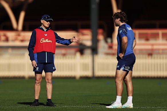 Joe Schmidt talks to Fraser McReight at Wallabies training.