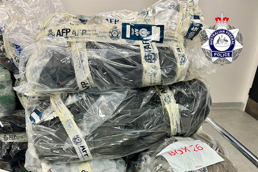 Bundles of cocaine on a police trolley.
