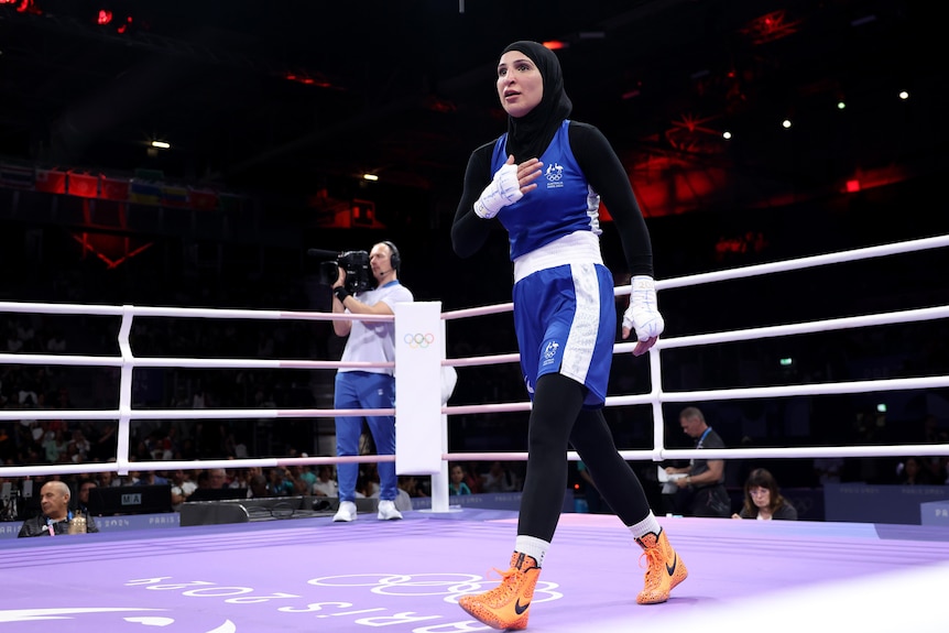 Tina Rahimi of Team Australia reacts to her defeat at the Olympics