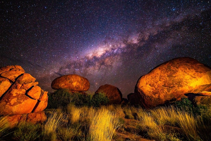 Devils Marbles rock formation at night.
