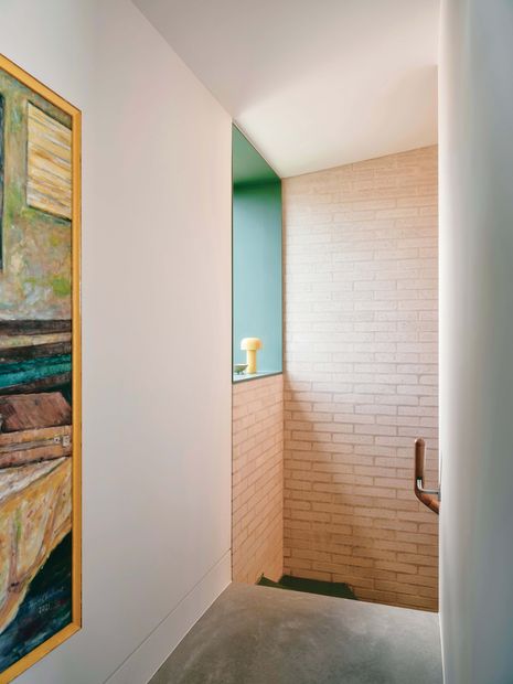 Colour and ample light bring a sense of joy to the robust palette of brick, steel and concrete.