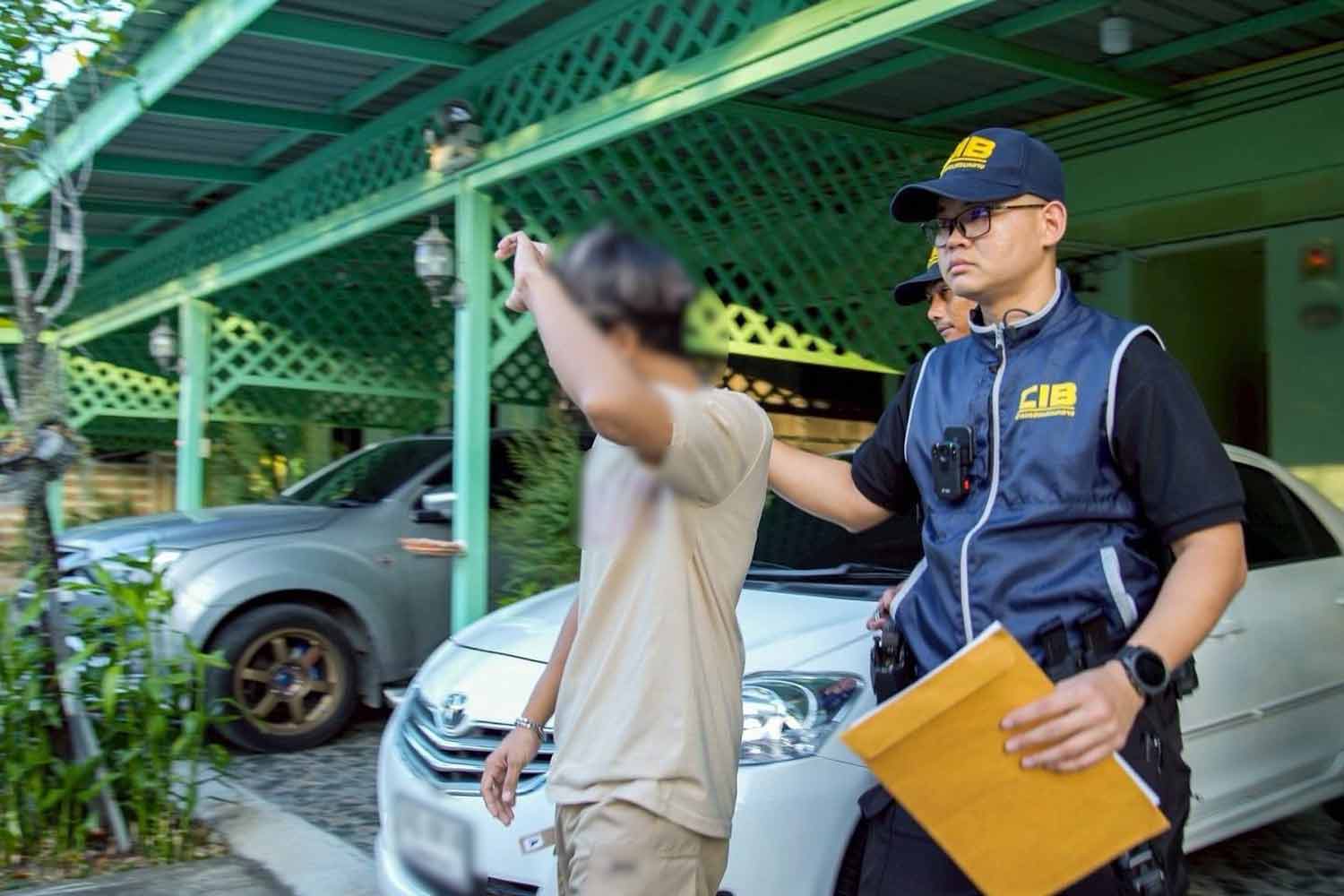 Police arrest the procurer in the sting operation in Chon Buri on Tuesday. Police photo