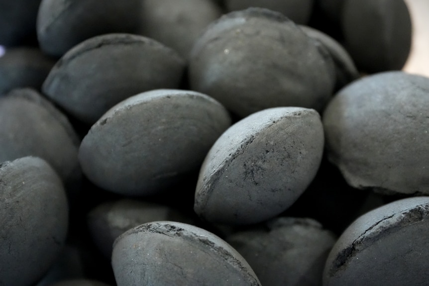 Up close of charcoal briquettes