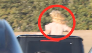 Britney Spears photographed through sunroof in LA freeway traffic