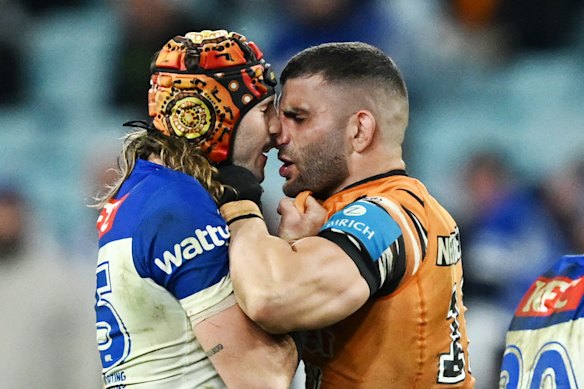 Josh Curran and Alex Twal clash right on full-time in the middle of Accor Stadium.