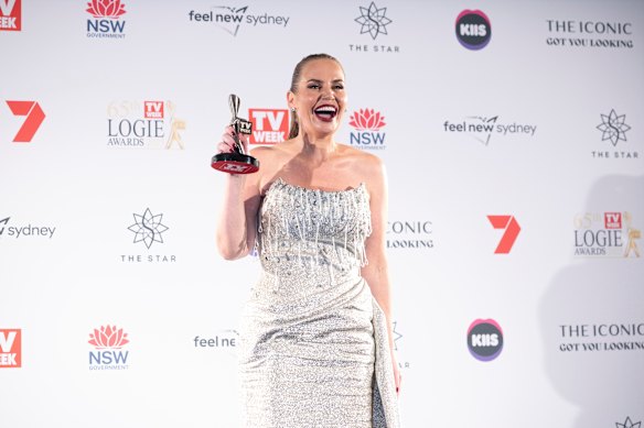 Dokic with her Logie, wearing a gown by Alin Le’ Kal.