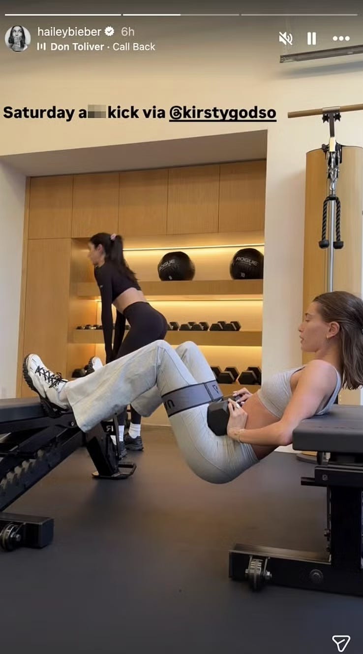 hailey bieber in a workout session at the gym, hip thrusts hailey bieber in a workout session at the gym, hip thrusts