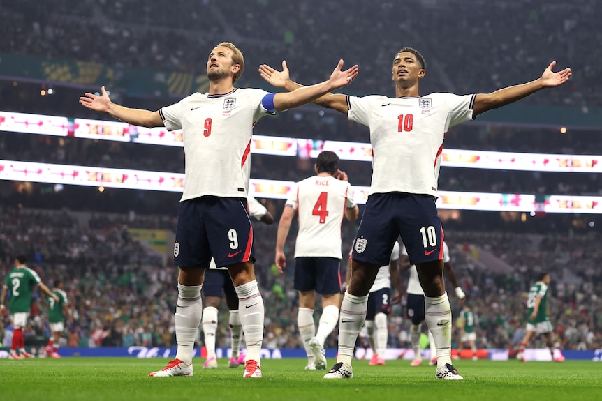 Harry Kane and Jude Bellingham celebrate an England goal