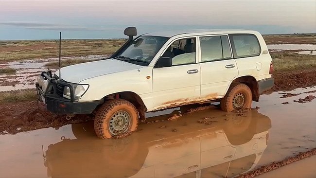 A Melbourne father and son have been rescued by billionaire Tim Roberts in the SA outback.