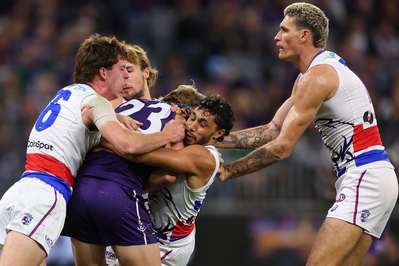 PERTH, AUSTRALIA - JULY 31: Arthur Jones of the Bulldogs tackles Karl Worner of the Dockers during the round 21 AFL match between Fremantle Dockers and Western Bulldogs at Optus Stadium, on July 31, 2026, in Perth, Australia. (Photo by Paul Kane/Getty Images via AFL Photos)