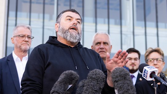 Damien Pollard during a press conference outside the High Court, in Canberra on Wednesday 13 September 2023. fedpol Photo: Alex Ellinghausen