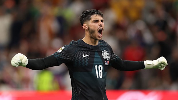 Patrick Beach celebrates the team's 2-0 victory over Türkiye.