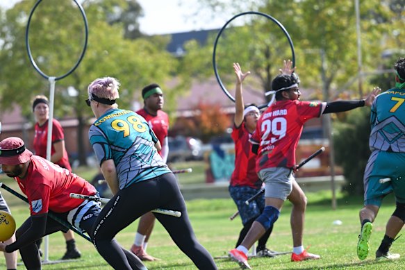 Players compete during a match of Quadball in Canberra as part of the state-wide competition.
