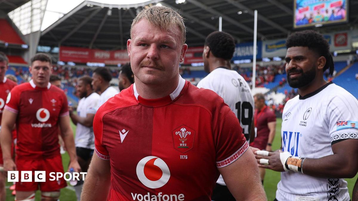 Wales hooker Dewi Lake in the foreground as Fiji players applaud off the Wales team at Cardiff City Stadium