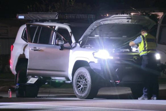 Police inspecting the 4WA involved in the crash. 
