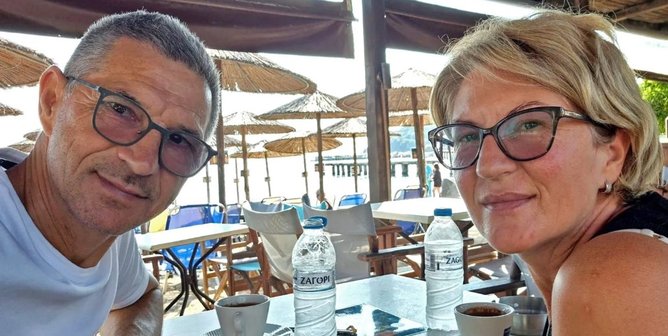 Ljubisa Karovic was saved from being sucked head-first out of the window of the plane by his wife Svetlana Grkovic and two passengers.