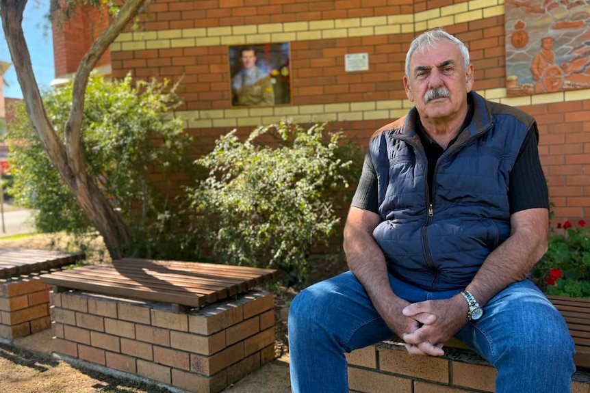 Man sitting on bench