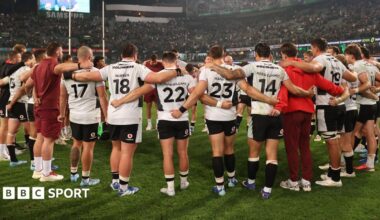 Wales players in a huddle after 43-0 defeat to South Africa