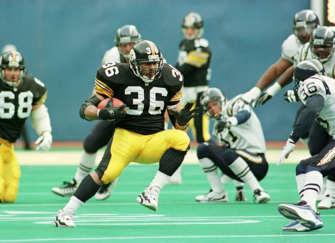 8 Dec 1996: Jerome Bettis #36 of the Pittsburgh Steelers makes his way through the San Diego Chargers' defense during the first quarter at Three Rivers Stadium in Pittsburgh, Pennslyvania. Mandatory Credit: Al Bello/Allsport