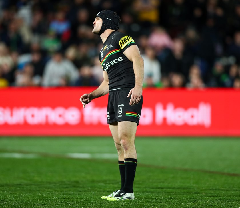 Nathan Cleary watches on as his field goal attempt hits the post. 