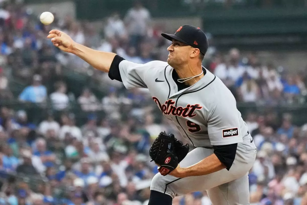 Detroit Tigers starting pitcher Jack Flaherty throws against the Chicago Cubs during the first inning of a baseball game in Chicago, Monday, July 20, 2026. (AP Photo/Nam Y. Huh)