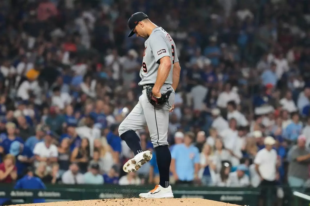 Detroit Tigers starting pitcher Jack Flaherty kicks the mound after Chicago Cubs' Seiya Suzuki of Japan, hit a two-run home run during the third inning of a baseball game in Chicago, Monday, July 20, 2026. (AP Photo/Nam Y. Huh)