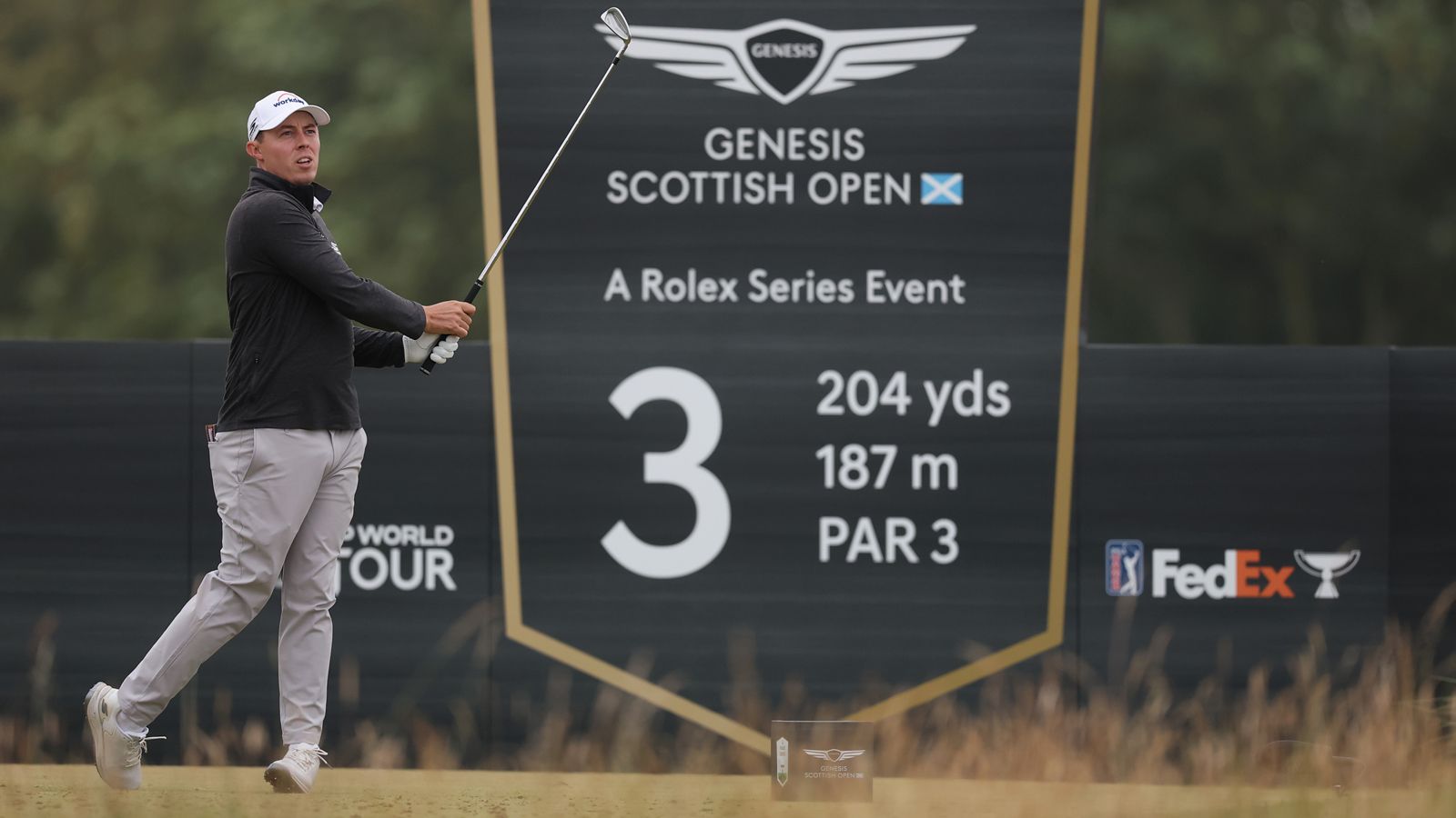 Matt Fitzpatrick hits a tee shot on the third tee