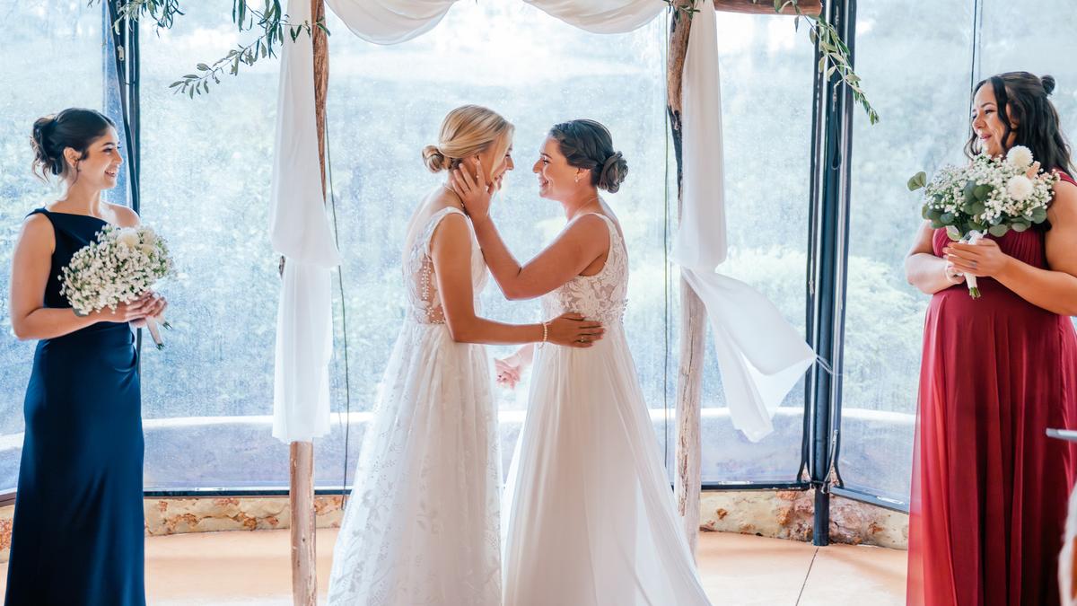 Wedding of the week: Brides wear matching hidden accessories under their wedding dresses