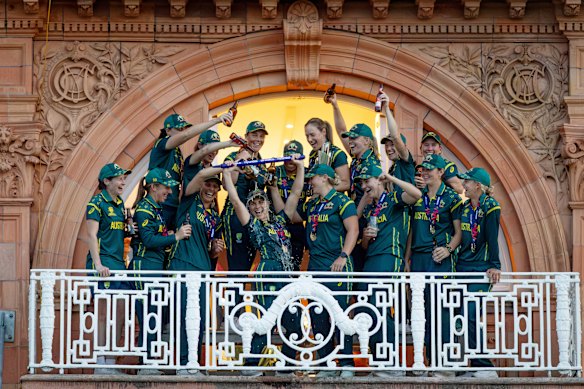 The Australian team celebrates on the balcony at Lord’s. 