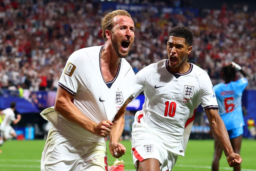 Harry Kane pulls at his shirt