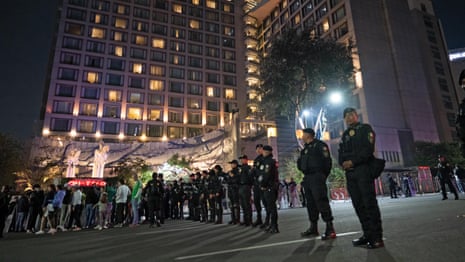 Police stand guard as Mexican fans attempt to disturb sleep of England players – video