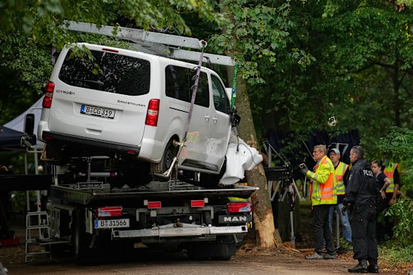 The vehicle used to ram into a crowd at the Pride March is removed from Berlin’s Tiergarten park on Sunday.