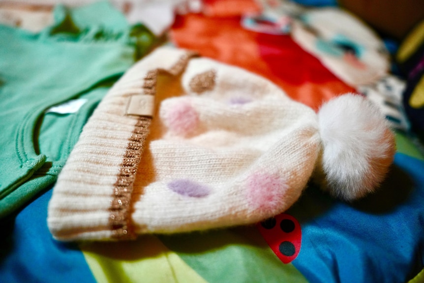 Close up image of a baby's beanie.